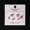 ( 5 mm ) Stud earrings with letter LUCK and crystal Gold