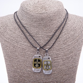 Matching Friendship Pendants "Love on a Cord", length 45cm, metal colour "silver and bronze"