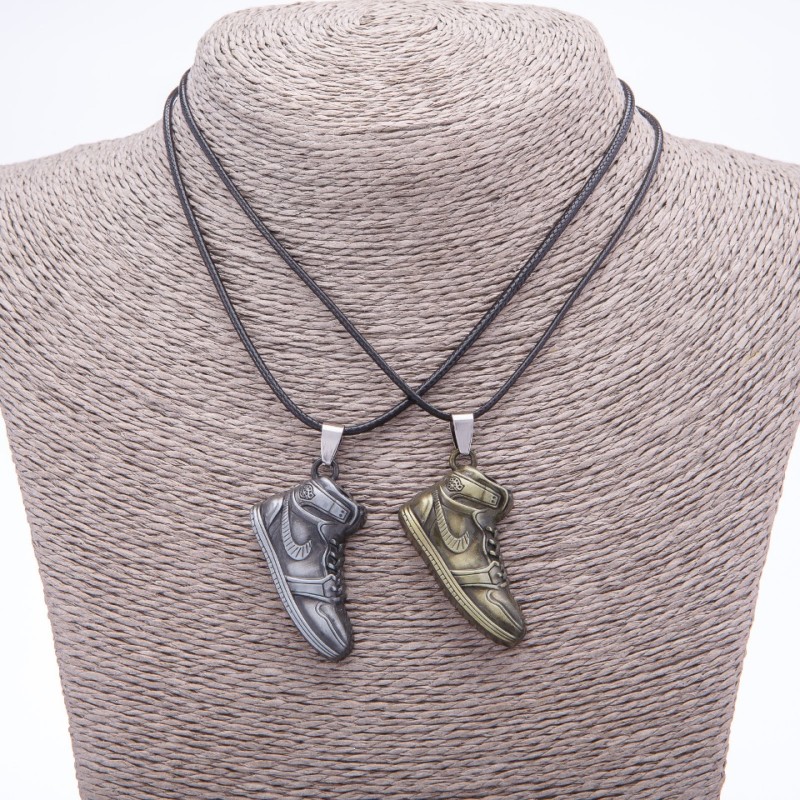 Matching Friendship Pendants "Sneakers on a Cord", length 45cm, metal colour "silver and bronze"