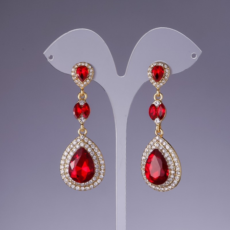 Earrings with red crystals, length 6cm, yellow metal
