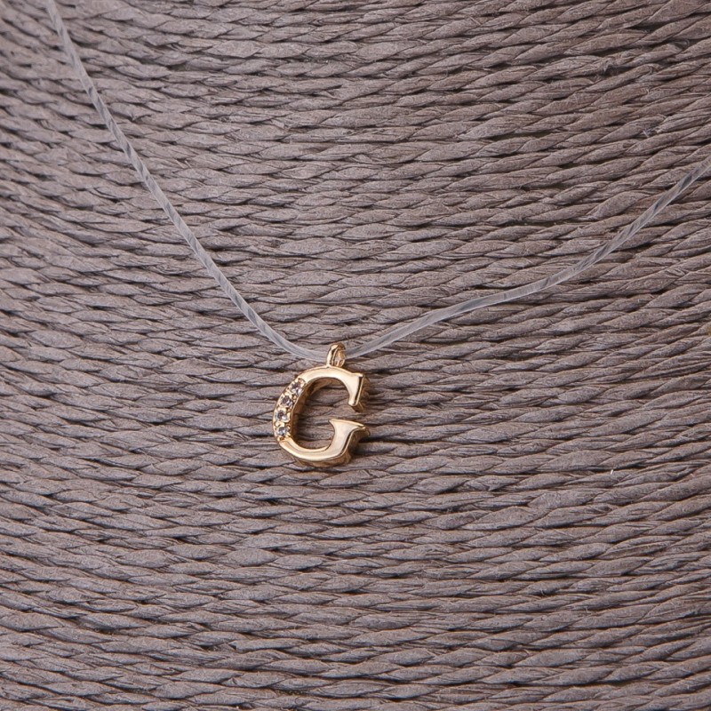 Pendant, diameter 9mm, on invisible silicone cord, length 39-44cm