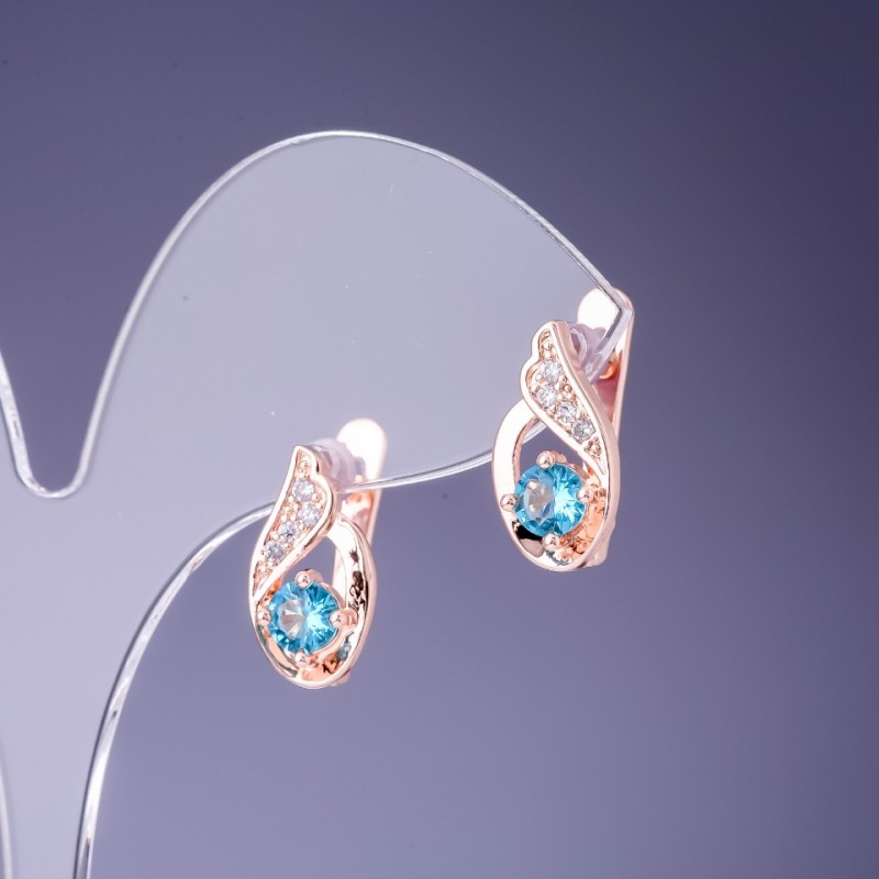 Earrings with light blue crystals 16x7mm in gold-tone metal