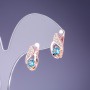 Earrings with light blue crystals 16x7mm in gold-tone metal