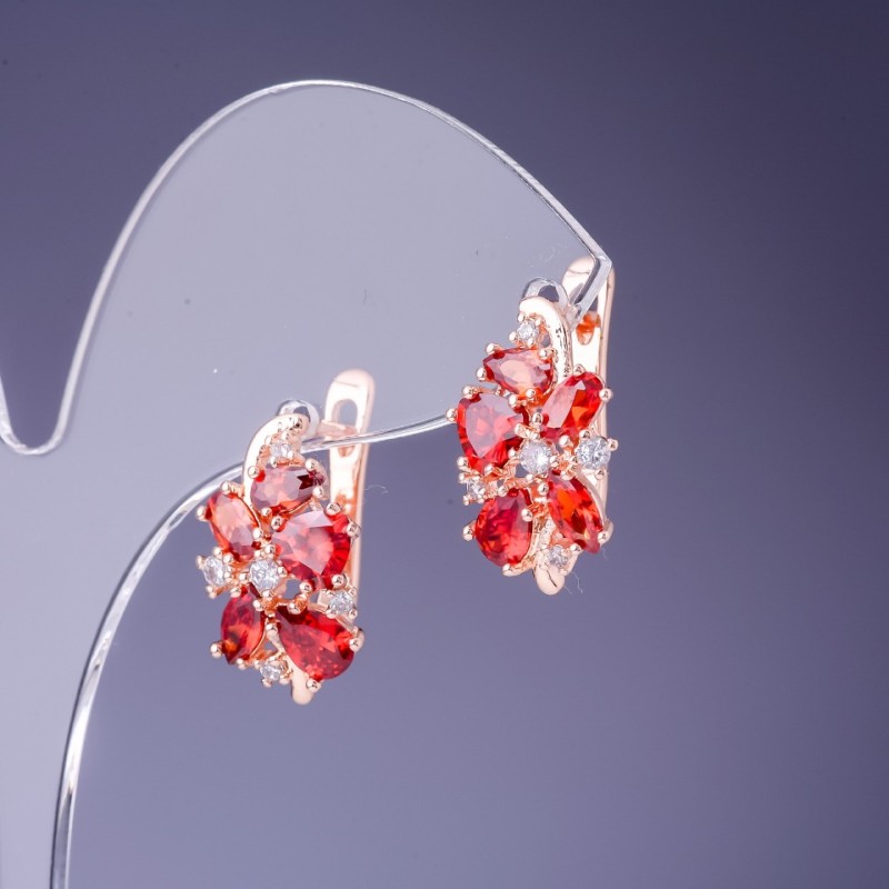 Earrings with red crystals 19×10mm in gold-toned metal