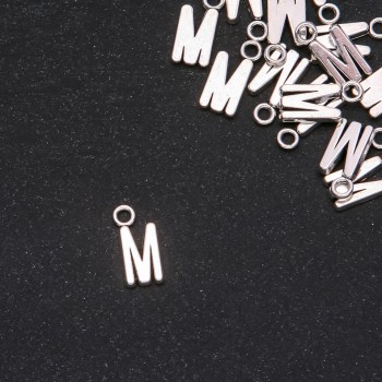 Pendant Finding Letter "M" 17x7mm packaging 20g (+- 15 pcs)