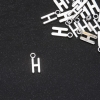 Pendant hardware Letter "H" 17x7mm packaging 20g (+- 22pcs)
