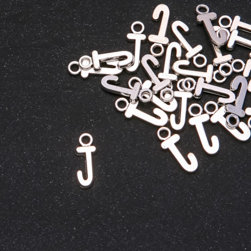Pendant hardware Letter "J" 17×7mmPackaging 20g (+- 30pcs)