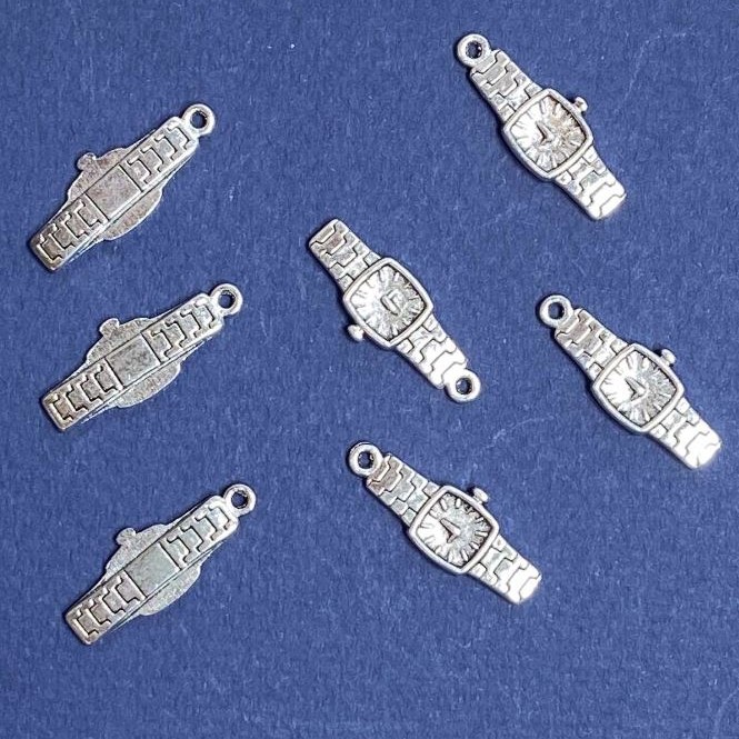 Pendant findings Clock 23×9mm packaged 20g +/- 17pcs