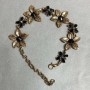 Bracelet Lilies with black crystals, dark gold colour, 25mm wide, 19–25cm length