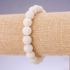 Bracelet with natural white sponge coral smooth beads, diameter 10mm on elastic, length 18cm