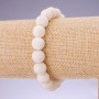 Bracelet with natural white sponge coral smooth beads, diameter 10mm on elastic, length 18cm