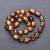 Tiger's Eye Beads on Thread - faceted, 9–12×8 mm, length 38 cm