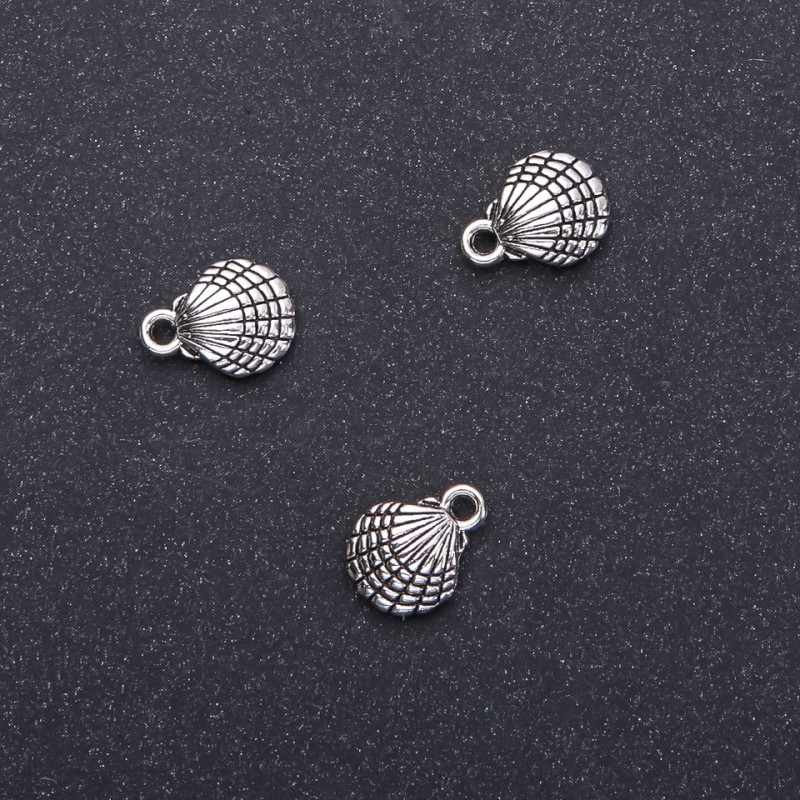 Pendant Finding Shell, Ø10mm, length 13mm, Ø1.5mm hole, packaging 20g, 18pc (+ -)