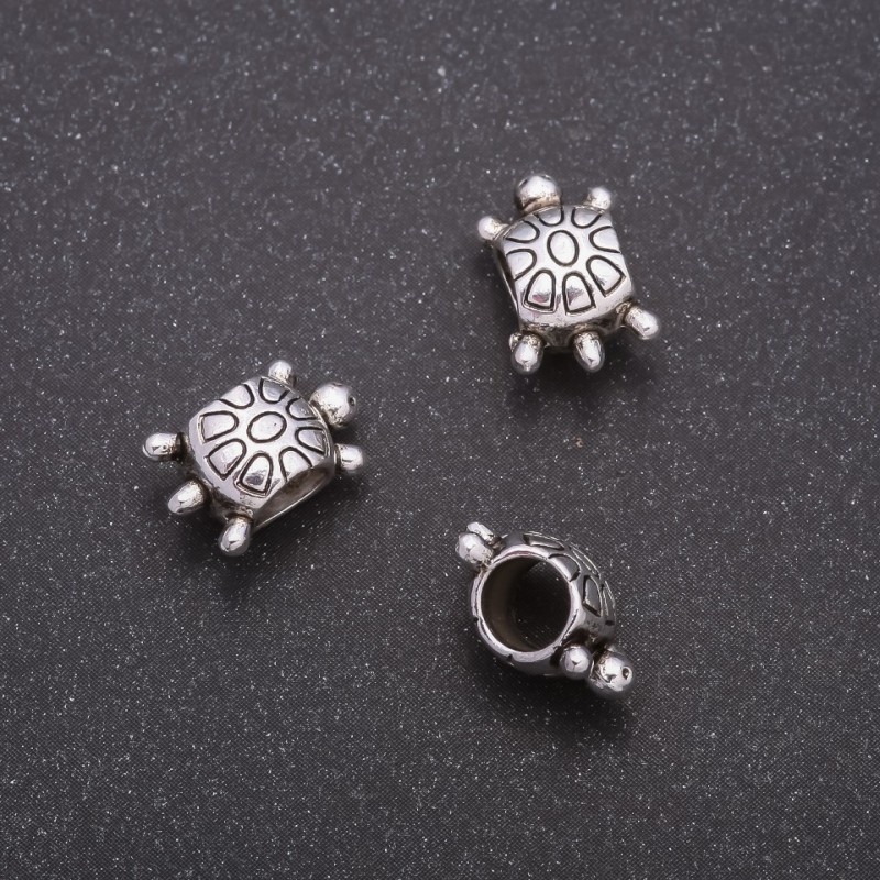 Bead finding insert 'Turtle' bead, diameter 12×8mm, inner diameter 5mm, pack 20 g ± 21 pcs