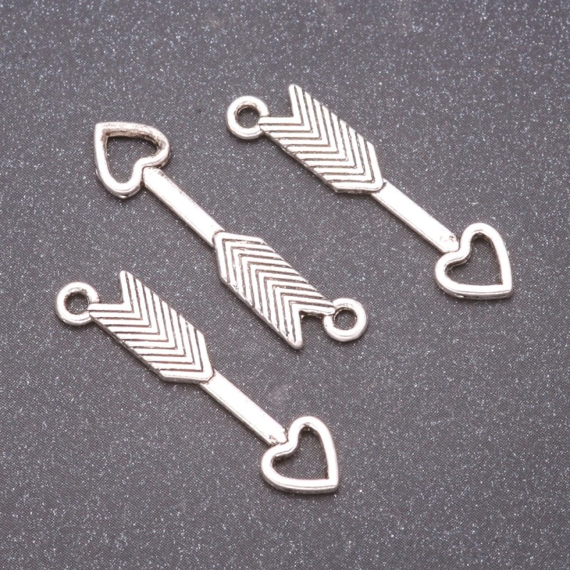 Pendant Connector Arrow, diameter 30x7mm, diameter in-1, 7mm pack 20g ± 19 pcs