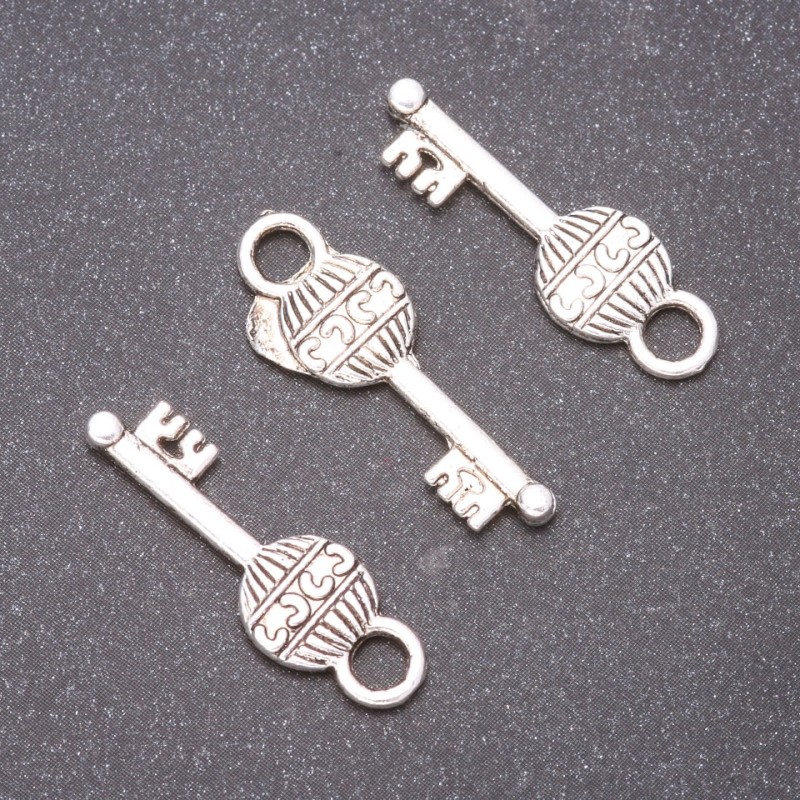 Pendant Finding Key, diameter 17x9mm, bore 3mm, packaging 20g ± 19 pcs