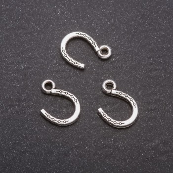 Pendant Finding Horse Shoe, diameter 10x14mm, diameter inmm packaging 20g approx. 44 pcs