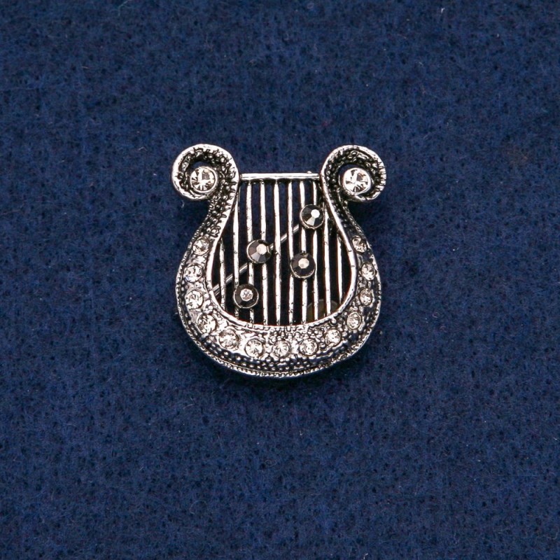 Brooch Lyre 25x23mm in dark rhinestones dark metal