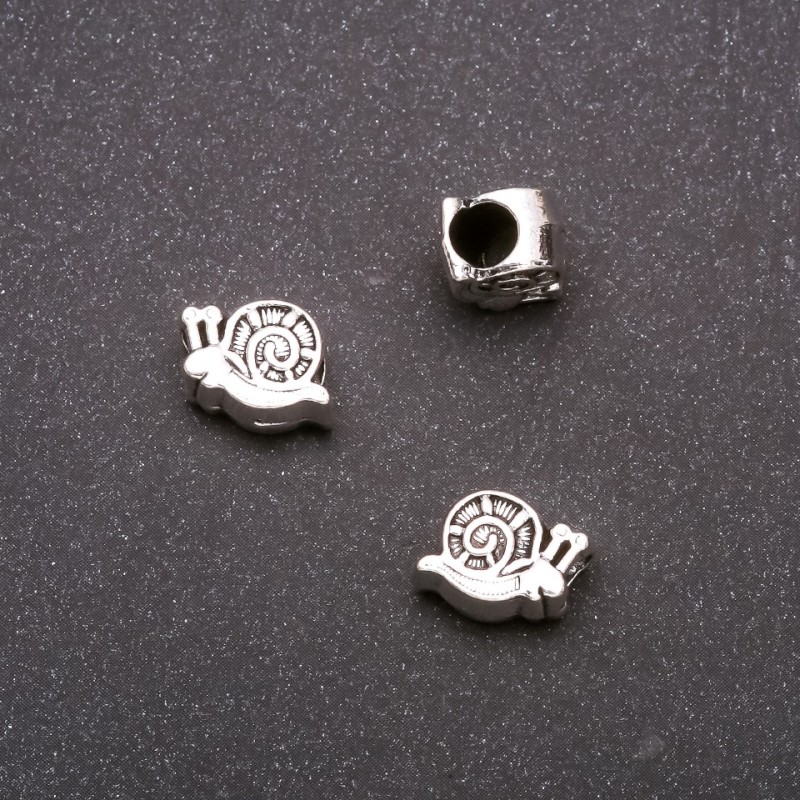 Bead Insertion Fittings Pandora Seashell Spiral 11x9mm, inner diameter 4mm, packaged 20g +/- 11 pieces