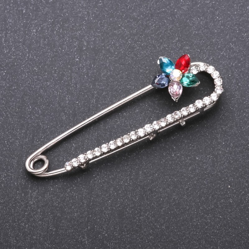 Brooch pin with multicoloured glass crystals 64×19mm white metal