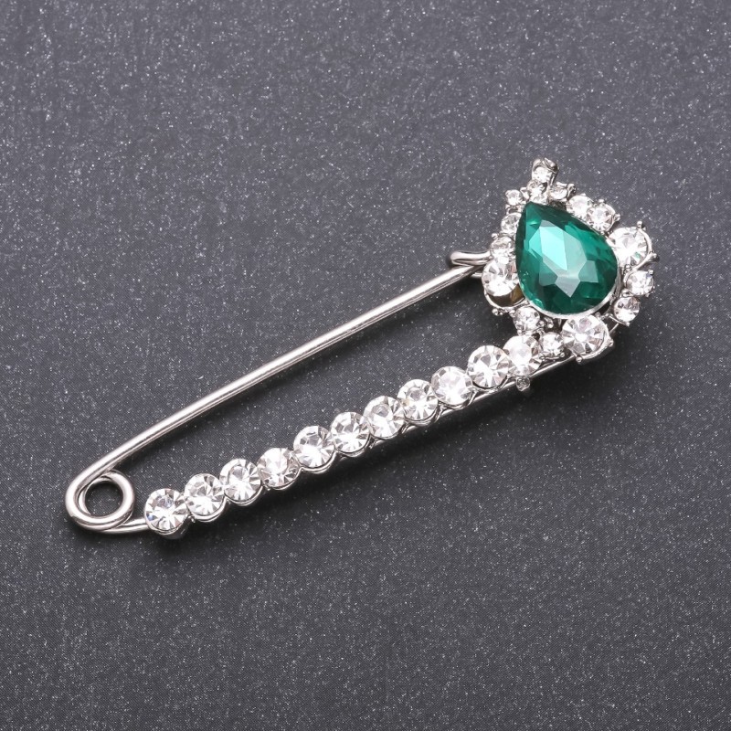 Brooch pin with green glass crystals 64x22mm white metal