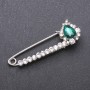 Brooch pin with green glass crystals 64x22mm white metal