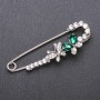 Brooch pin with green glass crystals 76x23mm white metal