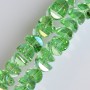 Crystal beads light green 6x4mm with light petrol coating, on a 50cm thread
