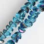 Crystal beads in Swarovski style, dark blue with violet petrol coating, 6x4mm, on thread, 50cm length