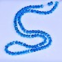 Crystal beads in Swarovski style blue faceted ball with petrol coating, diameter 5x4mm, thread length 48cm