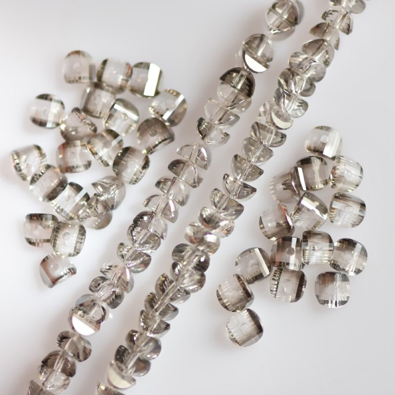 Crystal beads in Swarovski-style, silver-grey with coating, diameter 2.5×4 mm on a thread, length 48 cm