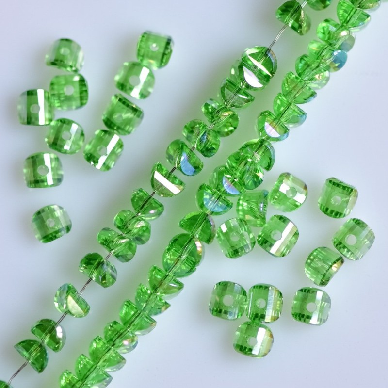 Crystal beads light green with purple sheen Swarovski-style, 2.5×4 mm on thread, 48 cm length