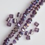 Crystal beads in Swarovski style purple with gold glaze “benzine”, diameter 2.5×4mm on thread, length 48cm