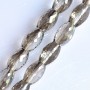 Crystal beads with faceted cut, silver-grey, 8x12mm, on thread, 70cm length