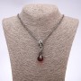 Pendant in "punk goth" style Ball in claws 15×32mm on chain, length 65cm
