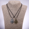 Pair of friendship pendants: Clubs with skulls, length 42-48cm, pendant 25x35mm