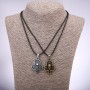 Pair of friendship pendants: Clubs with skulls, length 42-48cm, pendant 25x35mm