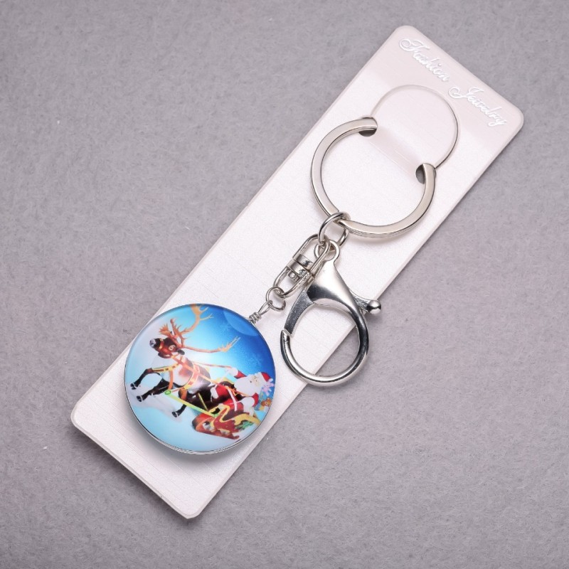 New Year Santa Claus on a Reindeer Keyring, length 10cm