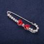 Pin Brooch Bow with White Rhinestones, Red Stones 64x18mm Silver-tone Metal