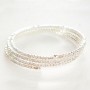 Slim spiral bracelet with three turns, white small rhinestones, circumference 18–22 cm