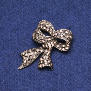Clearance! Bow Brooch with Rhinestones golden metal 35x53mm