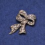 Clearance! Bow Brooch with Rhinestones golden metal 35x53mm