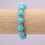 Turquoise (imitation) Bracelet on elastic, diameter 10mm+-, length 18cm, with inserts and rhinestones