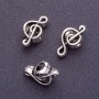 Pandora Bead Finding Treble Clef, length 18mm, hole dia 1-4mm, silver colour, pack 20g +/-11pcs