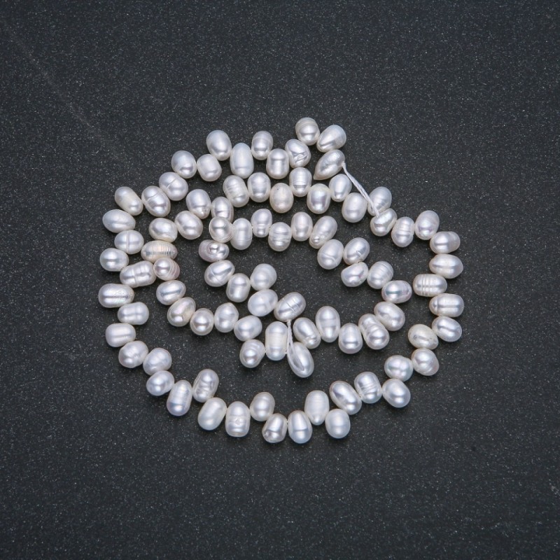 River Pearl Strand, diameter 6x4mm, length 36cm (+-), with petrol sheen