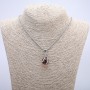 Pendant "Ball in Paw" 35x17mm on chain, length 70cm +/- silver-tone metal