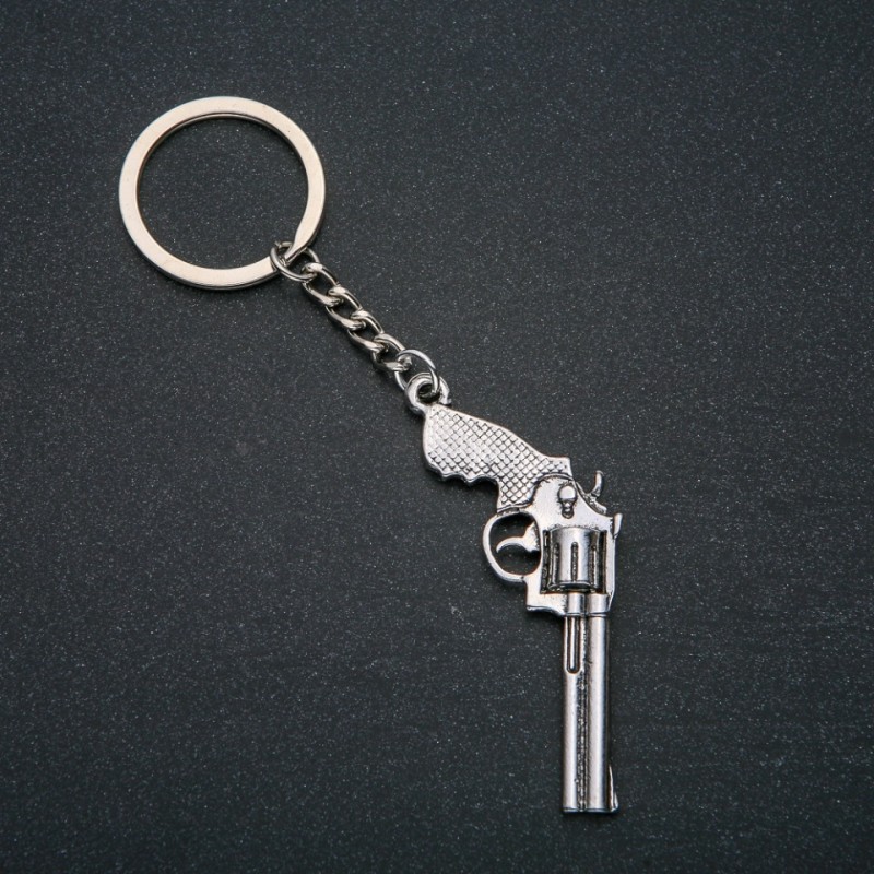 Keyring "Revolver", 62x28mm diameter, 12cm length +/- silver-coloured metal