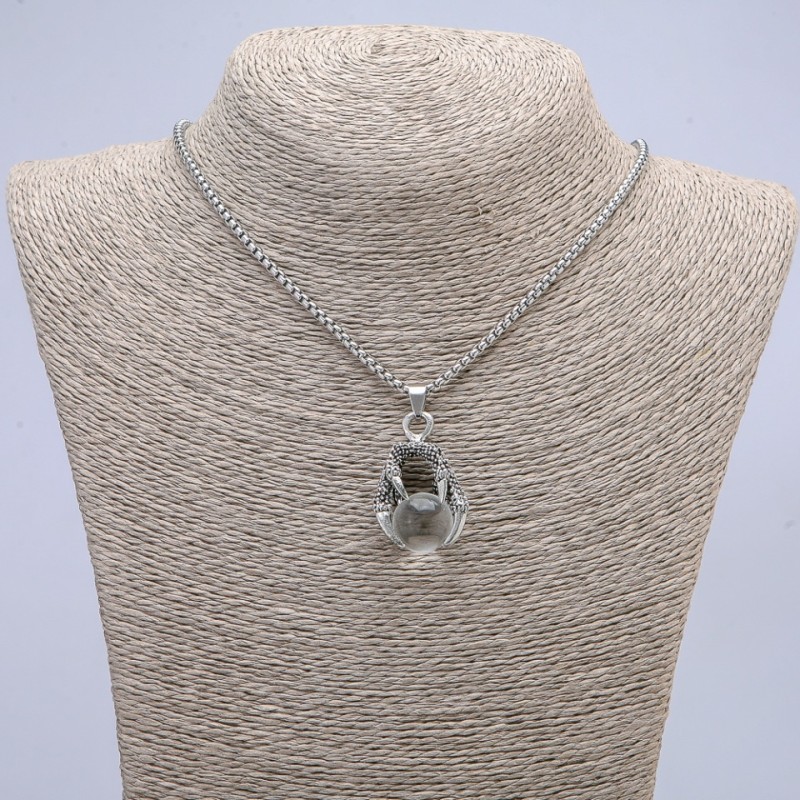 Pendant "Sphere in a Paw" 42x22mm on a chain, length 70cm +/- silver-coloured metal