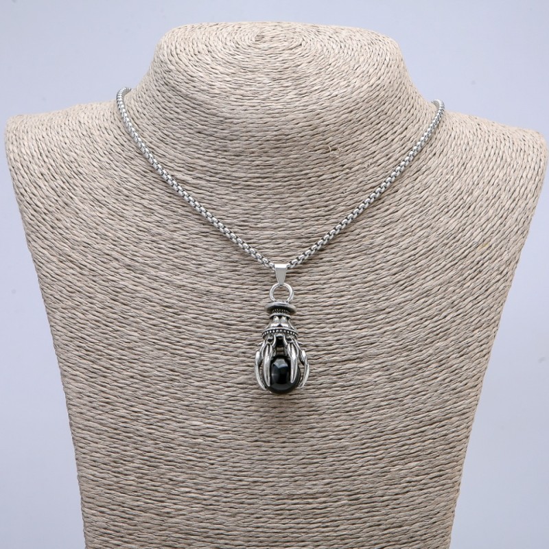 Pendant "Paw with Sphere" 40x20mm on a chain, length 70cm +/- silver-coloured metal