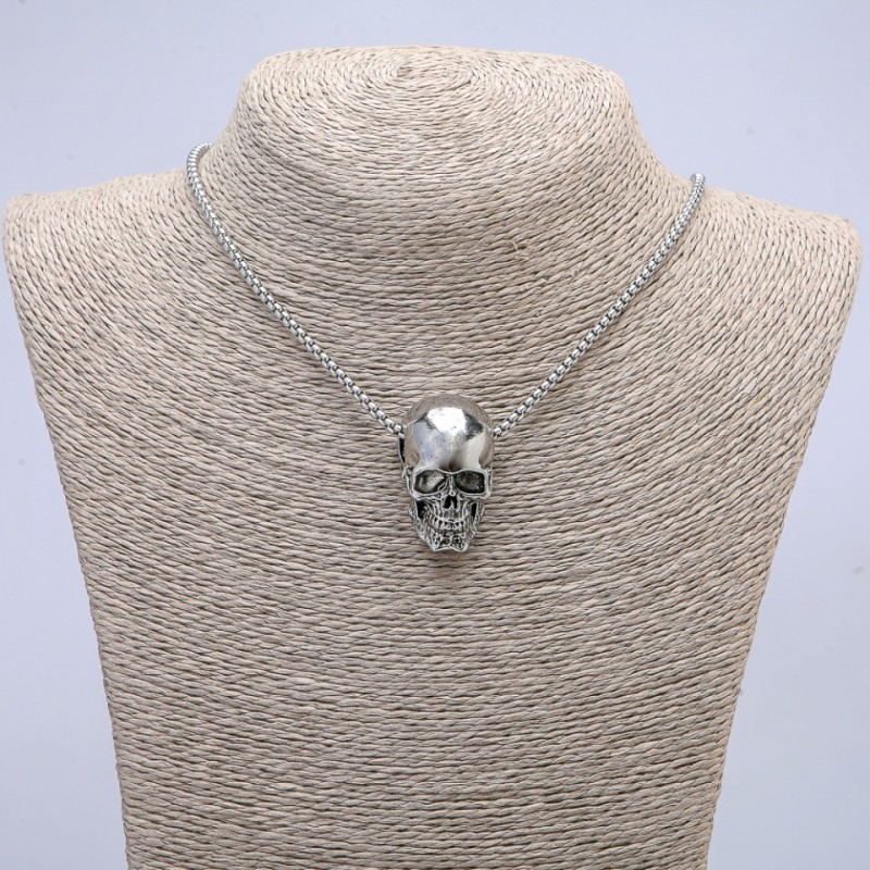 Skull Pendant 28x17mm on a chain, 65cm length, silver-coloured metal